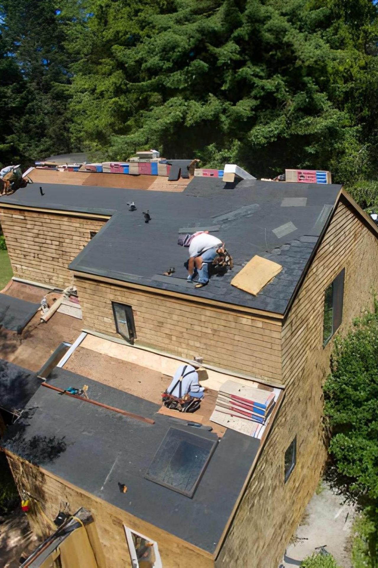 Installing new roof taken from high angle