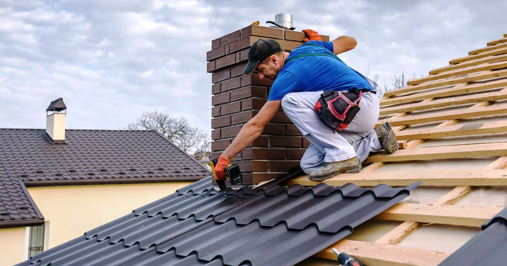 Roofing contractor inspecting a Philadelphia roof